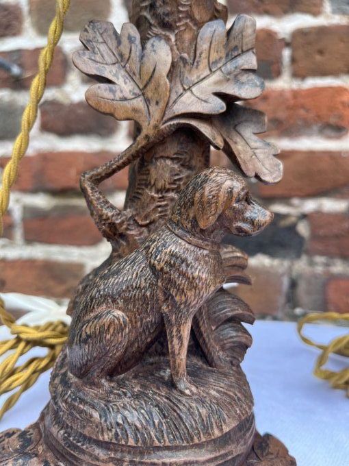 Paire de petits bougeoirs en bois sculpté 